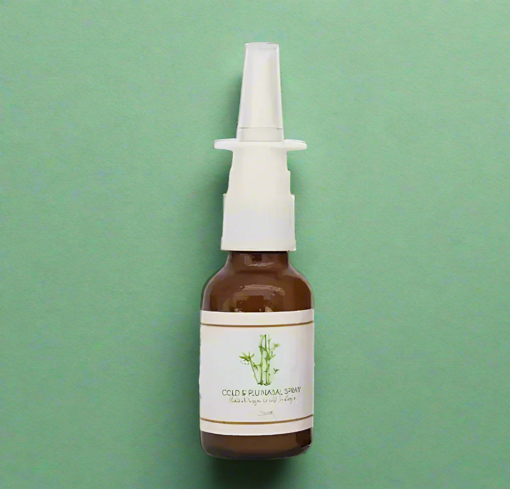 Bottle of cold and flu spray with a white label on a white background