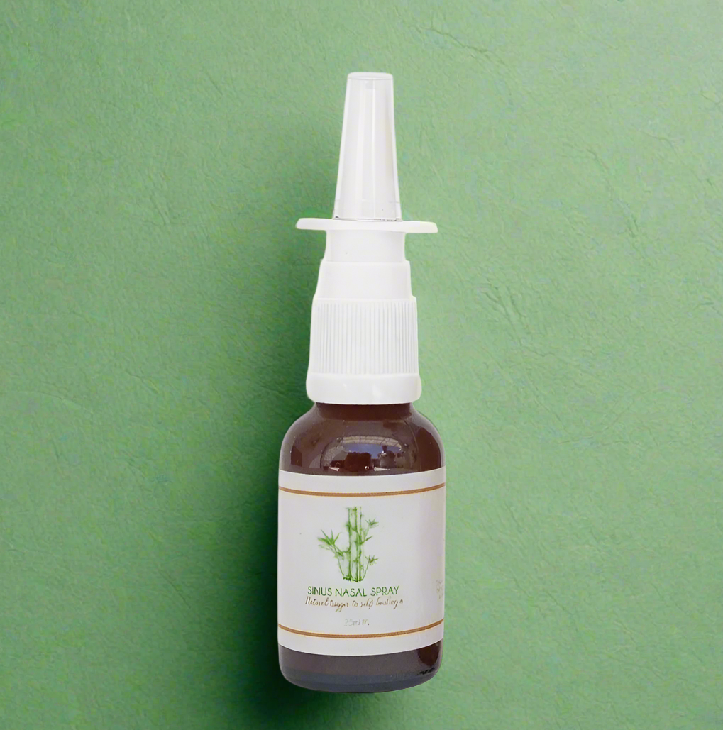 Sinus nasal spray bottle with label on a white background
