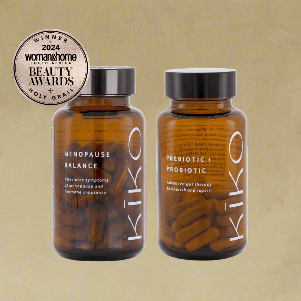 Two Kiko supplement bottles with capsules on a green background, featuring the 2024 Womanhome Beauty Awards winner badge.